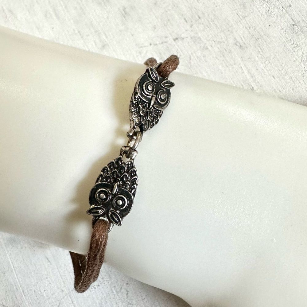 Silver tone owl charm brown cord bracelet